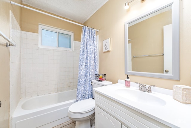 213 Amistad Rd, San Angelo, TX 76901 - full bath featuring vanity, shower / bath combo with shower curtain, and a textured ceiling