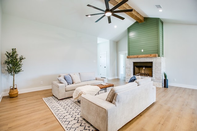 3609 Clearview Dr, San Angelo, TX 76904 - living room with ceiling fan, light wood-style floors, a fireplace with raised hearth, and recessed lighting