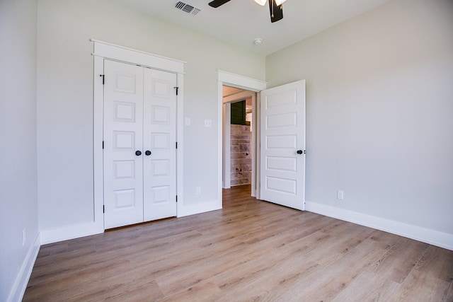 3609 Clearview Dr, San Angelo, TX 76904 - unfurnished bedroom with light wood-type flooring, a closet, and a ceiling fan