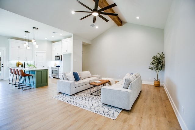 3609 Clearview Dr, San Angelo, TX 76904 - living area with a ceiling fan, beam ceiling, light wood finished floors, high vaulted ceiling, and recessed lighting