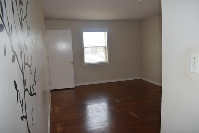 empty room featuring dark hardwood / wood-style floors