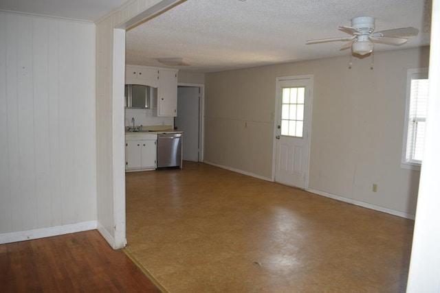 interior space with sink, a textured ceiling, and ceiling fan