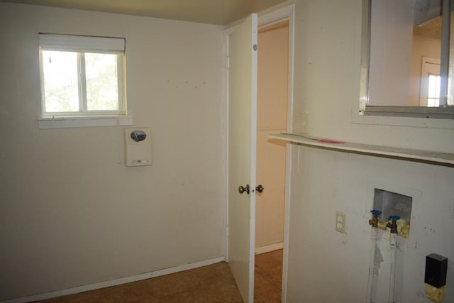 clothes washing area with hookup for a washing machine