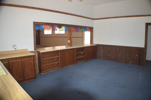 unfurnished room featuring carpet floors and a textured ceiling