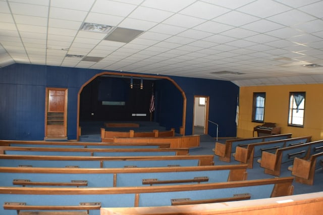 cinema room with a paneled ceiling