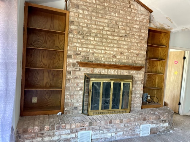 165 Edinburgh Rd, San Angelo, TX 76901 - unfurnished living room with a fireplace and visible vents