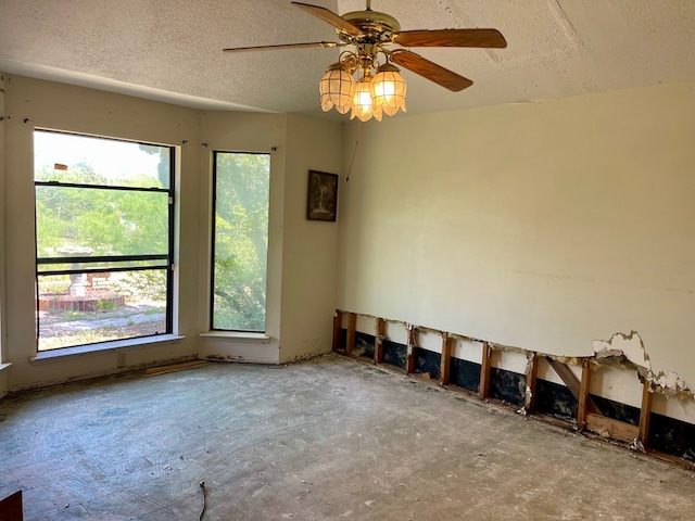 165 Edinburgh Rd, San Angelo, TX 76901 - spare room with plenty of natural light, a textured ceiling, and ceiling fan