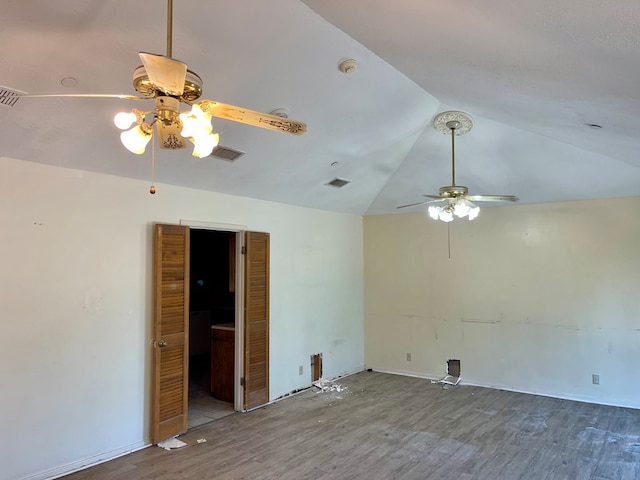 165 Edinburgh Rd, San Angelo, TX 76901 - empty room with lofted ceiling, visible vents, wood finished floors, and ceiling fan