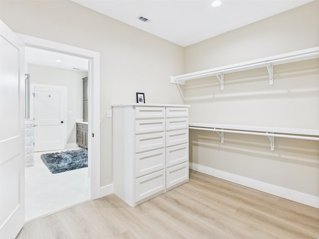 1942 Pine Valley St, San Angelo, TX 76904 - walk in closet featuring light wood-style floors