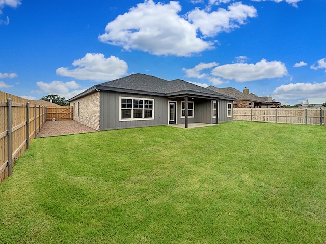 1942 Pine Valley St, San Angelo, TX 76904 - back of property featuring a patio and a fenced backyard