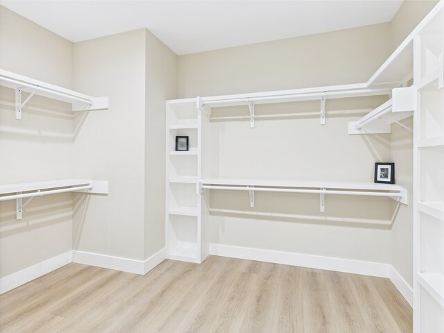 1942 Pine Valley St, San Angelo, TX 76904 - walk in closet with wood finished floors