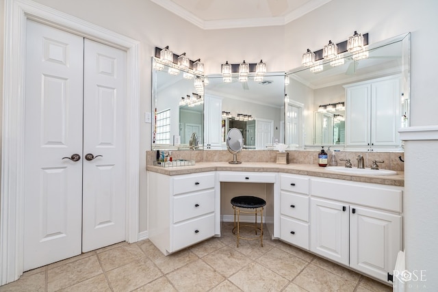 2141 Valleyview Dr, San Angelo, TX 76904 - bathroom featuring crown molding, double vanity, and tile patterned flooring