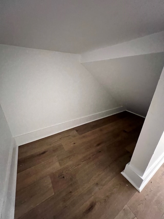 bonus room with hardwood / wood-style flooring