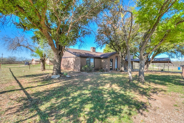 exterior space featuring a front yard