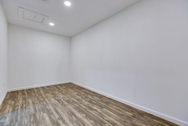 unfurnished room featuring dark hardwood / wood-style floors