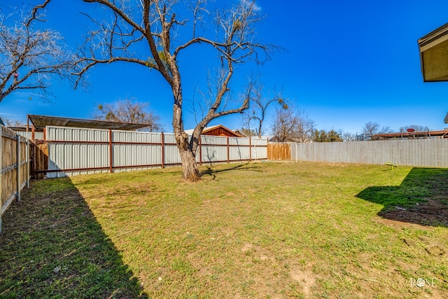 view of yard featuring a fenced backyard