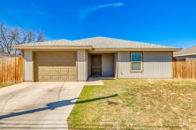 view of front facade featuring a garage, concrete driveway, a front yard, and fence