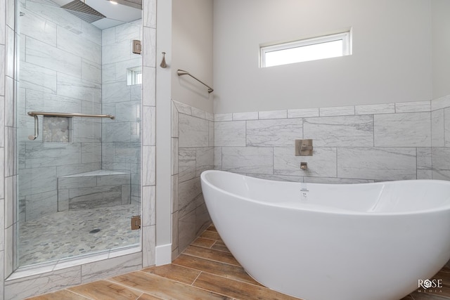 bathroom with independent shower and bath