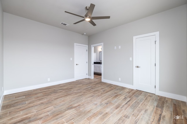 spare room with ceiling fan