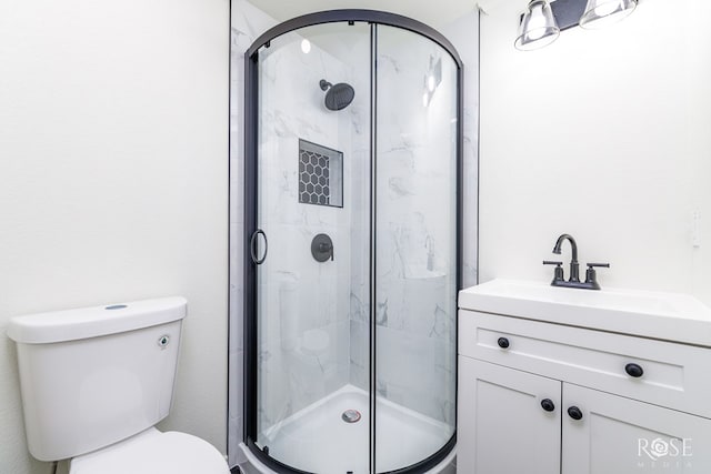 4815 Bowie St, San Angelo, TX 76903 - full bath featuring a stall shower, toilet, and vanity