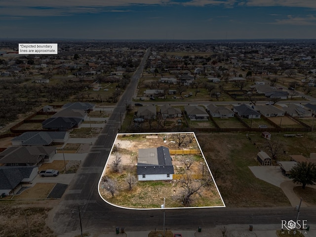 4815 Bowie St, San Angelo, TX 76903 - aerial view of property's location featuring property parcel outlined and nearby suburban area