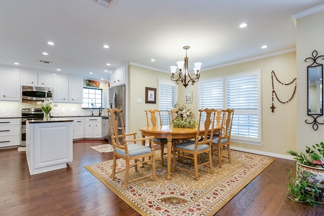 dining area featuring visible vents, a chandelier, baseboards, ornamental molding, and dark wood-style floors