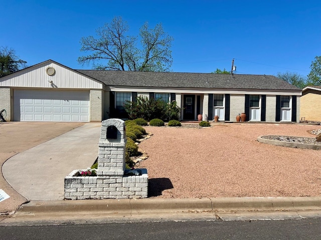 2708 A & M Ave, San Angelo, TX 76904 - ranch-style home with brick siding, a garage, and driveway