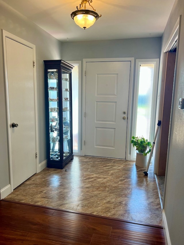 2708 A & M Ave, San Angelo, TX 76904 - entryway featuring wood finished floors and baseboards