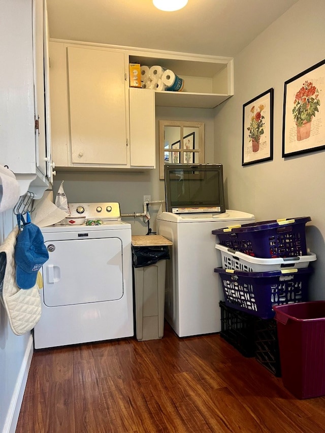 2708 A & M Ave, San Angelo, TX 76904 - washroom with washing machine and dryer, cabinet space, and dark wood finished floors
