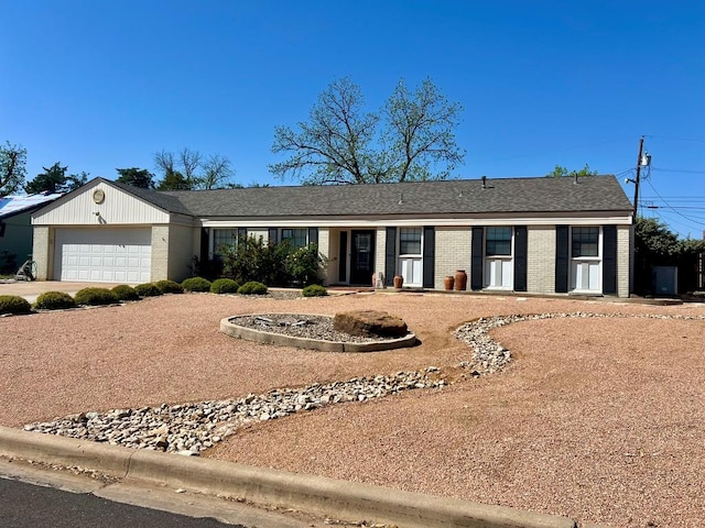 2708 A & M Ave, San Angelo, TX 76904 - ranch-style home with brick siding, a garage, and driveway