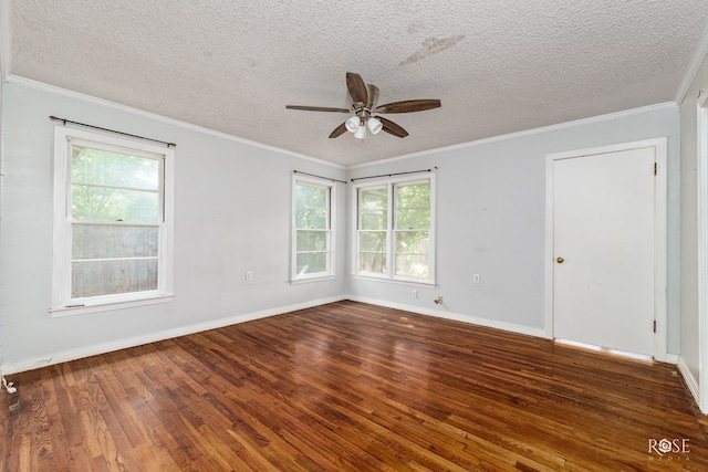 2609 W Beauregard Ave, San Angelo, TX 76901 - empty room with ceiling fan, a textured ceiling, plenty of natural light, and wood finished floors