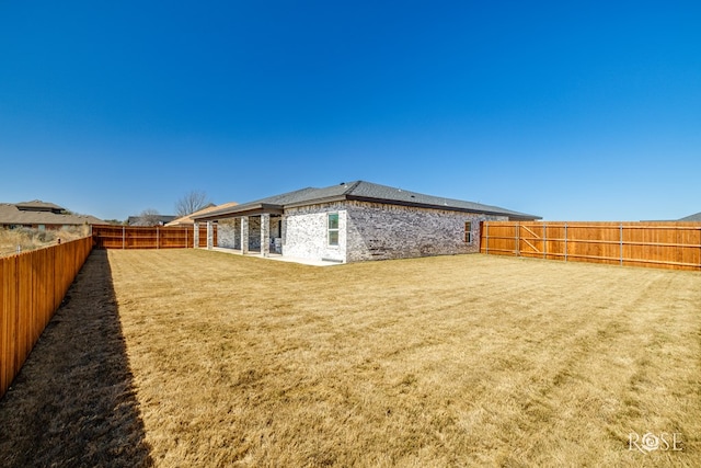 1609 Club House Ln, San Angelo, TX 76904 - back of property featuring brick siding