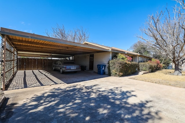 109 Live Oak Dr, Ozona, TX 76943 - view of front of house with concrete driveway and fence