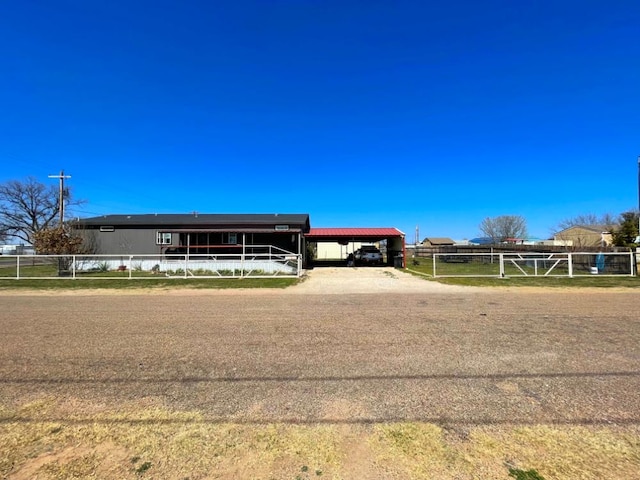 view of front of property with an attached carport