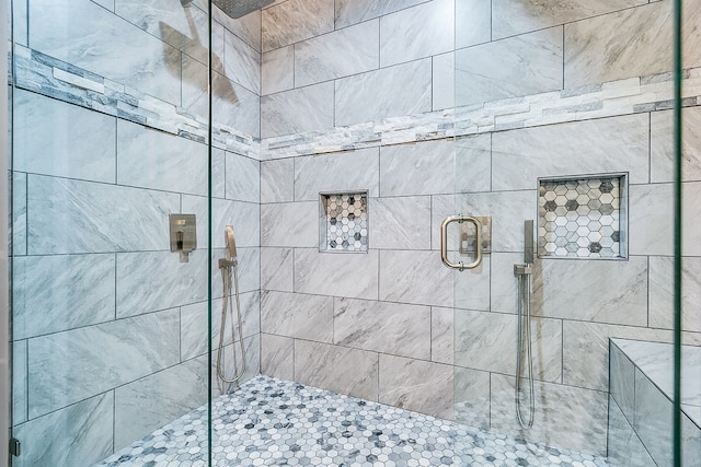 bathroom with an enclosed shower