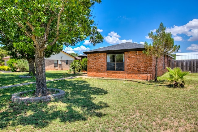 1106 Gregory Dr, San Angelo, TX 76905 - rear view of house featuring brick siding