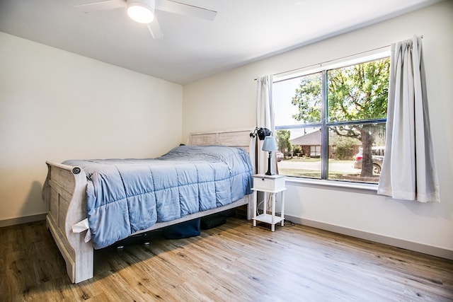 1106 Gregory Dr, San Angelo, TX 76905 - bedroom with wood finished floors and a ceiling fan