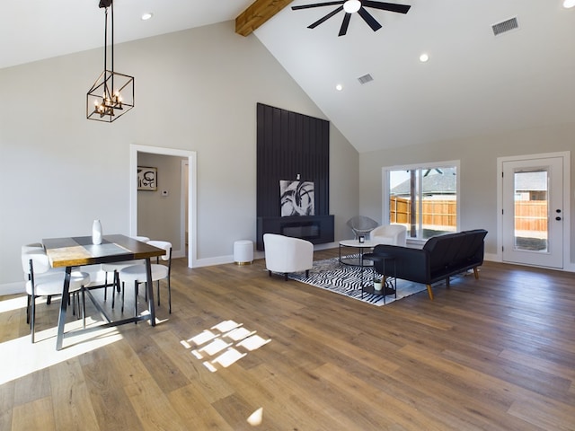 3616 Clearview Dr, San Angelo, TX 76904 - living area featuring high vaulted ceiling, a ceiling fan, beamed ceiling, wood finished floors, and a chandelier