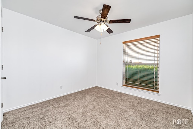 4129 Sedona Trl, San Angelo, TX 76904 - empty room featuring carpet, a ceiling fan, and baseboards