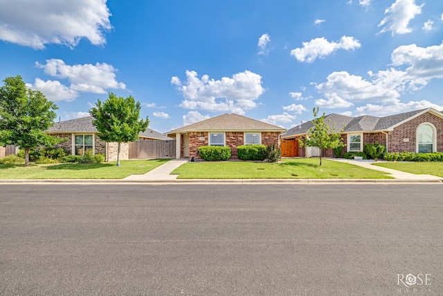 4129 Sedona Trl, San Angelo, TX 76904 - view of front facade with brick siding and concrete driveway