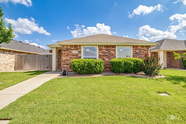 4129 Sedona Trl, San Angelo, TX 76904 - view of front of house with brick siding and a shingled roof