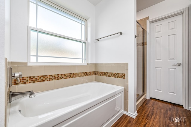 4129 Sedona Trl, San Angelo, TX 76904 - full bathroom with a garden tub, a stall shower, and wood finished floors