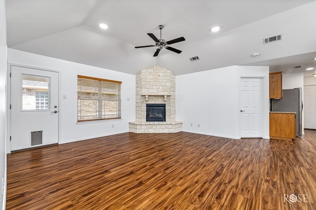 4129 Sedona Trl, San Angelo, TX 76904 - unfurnished living room featuring ceiling fan, lofted ceiling, dark wood finished floors, a fireplace, and recessed lighting