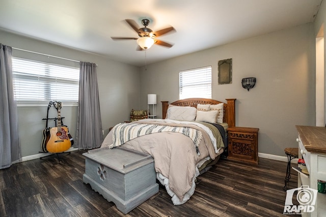 bedroom featuring ceiling fan and dark hardwood / wood-style flooring