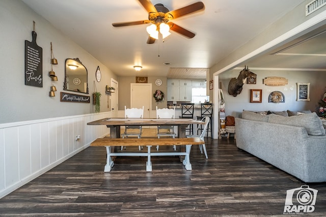 dining room featuring dark hardwood / wood-style flooring and ceiling fan