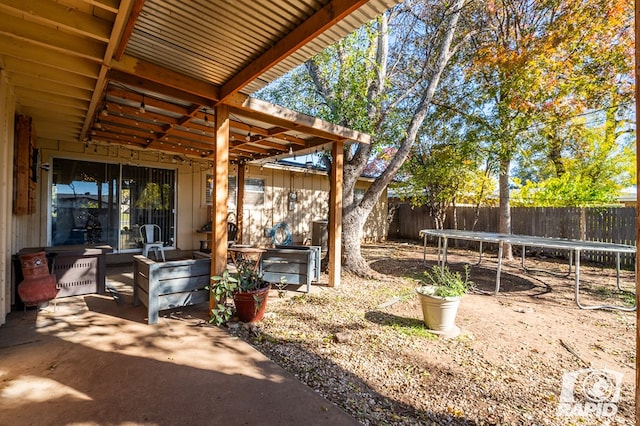 view of yard with a patio and a trampoline