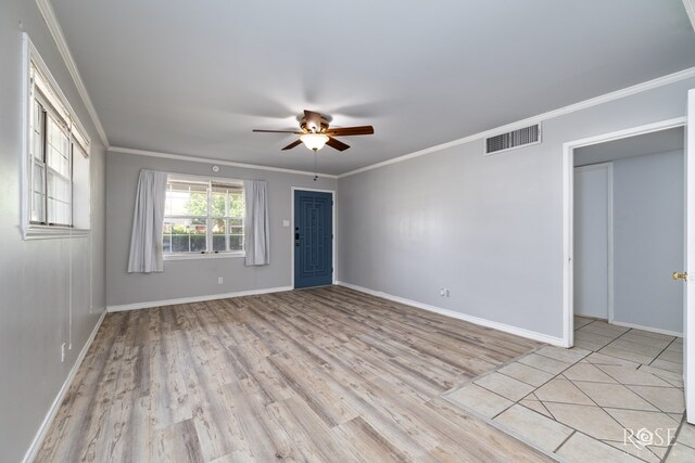 3109 College Hills Cir, San Angelo, TX 76904 - unfurnished room featuring ceiling fan, light wood-type flooring, crown molding, and baseboards
