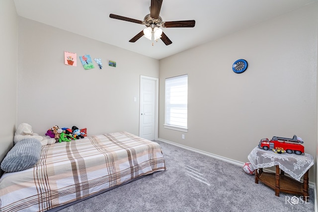 carpeted bedroom with ceiling fan