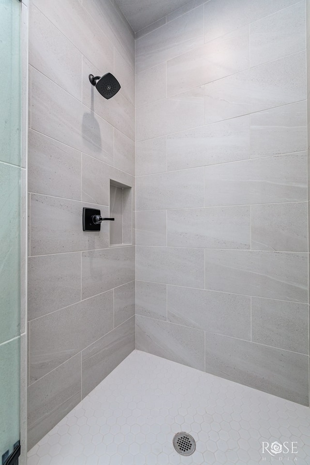 full bathroom with a stall shower