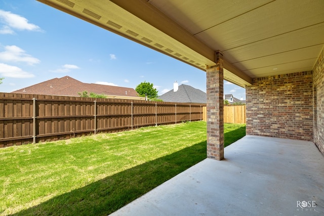 5441 Riviera Ln, San Angelo, TX 76904 - view of yard featuring a patio area and a fenced backyard